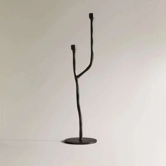 Matte black iron candelabra with European retro design for taper candles, ideal tabletop decor.