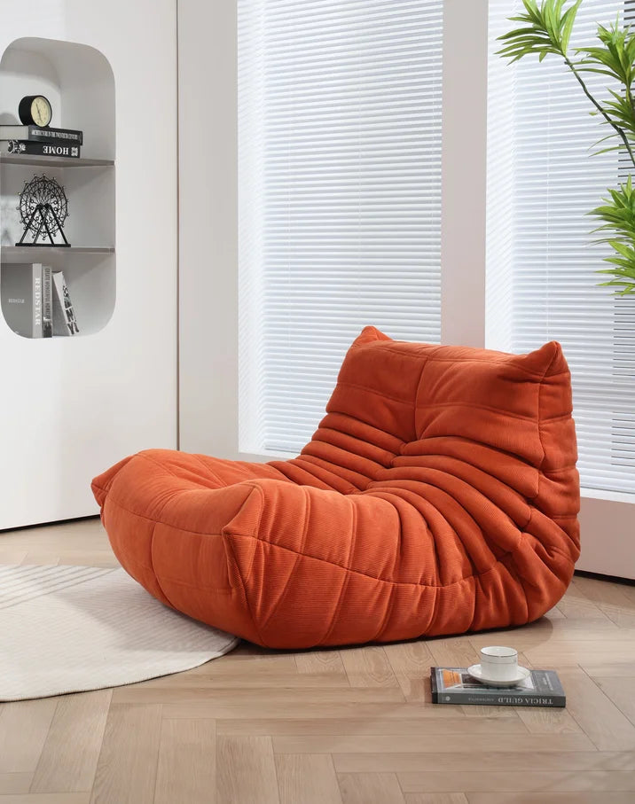 Modern orange corduroy Togo sofa set with view of mountains - sparkledecor.com