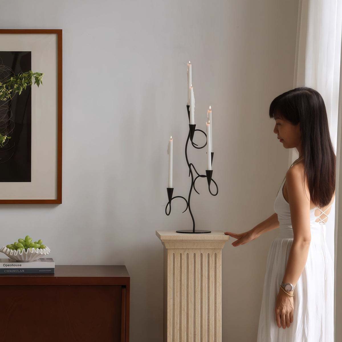 Black Wrought Iron branch-shaped candle holder with three slender candle cups and sculptural vintage design
