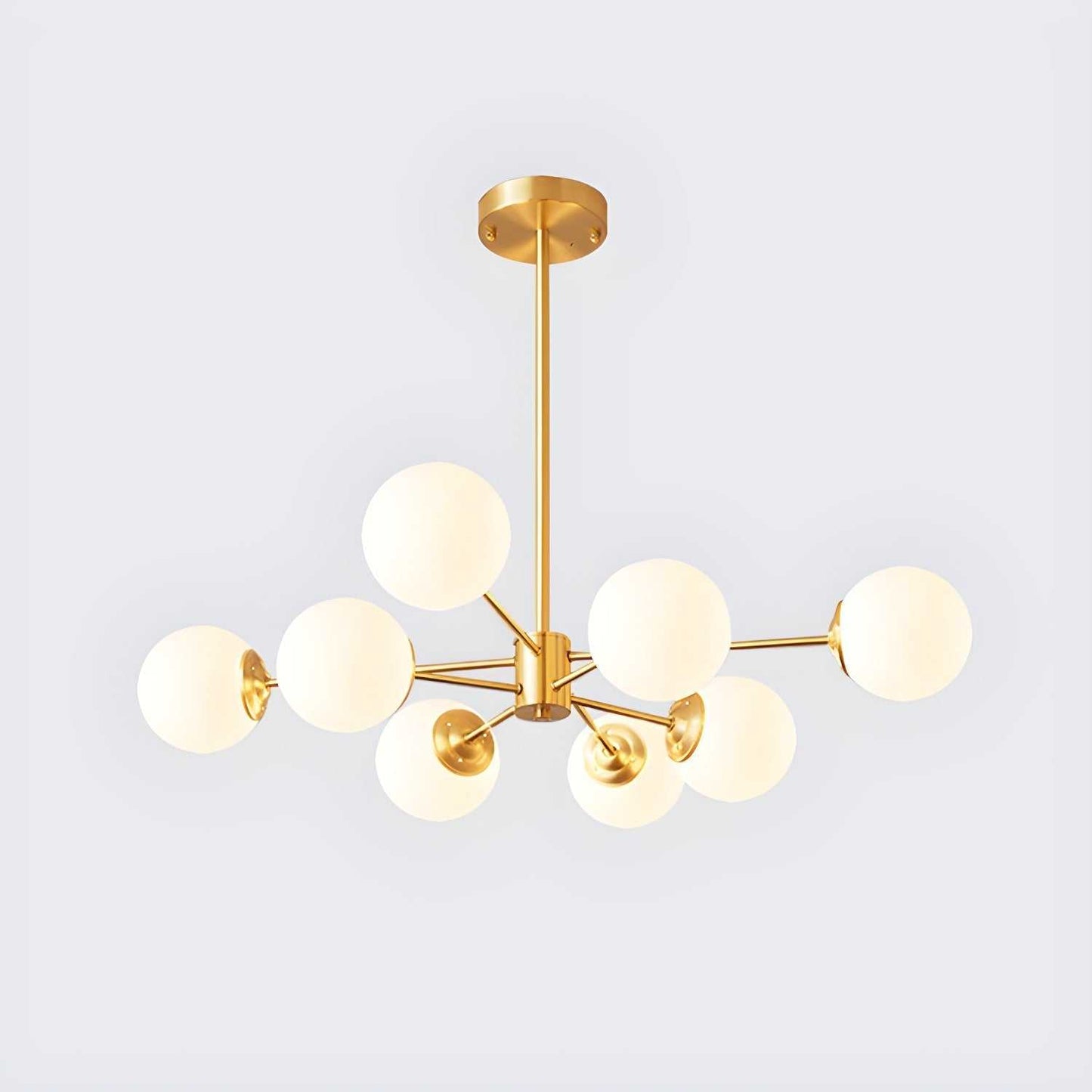 Modern gold globe pendant light with 8 frosted glass shades in a Sputnik chandelier design