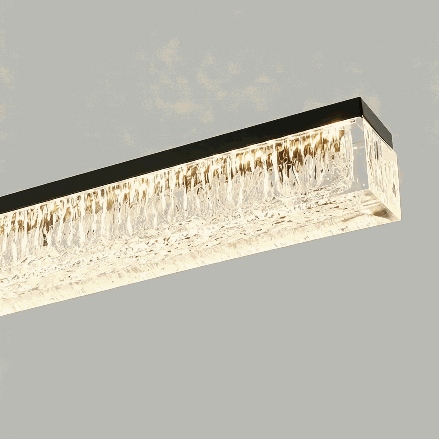 Italian minimal adjustable linear pendant lamp with matte black painted iron frame and acrylic shade hanging over dining table