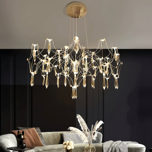 Stylish LED crystal chandelier illuminating a dining area with modern elegance - sparkledecor.com