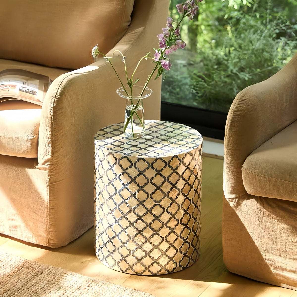 Luxury shell-inspired side table with classic cylindrical design, handcrafted natural materials, and multi-purpose use.