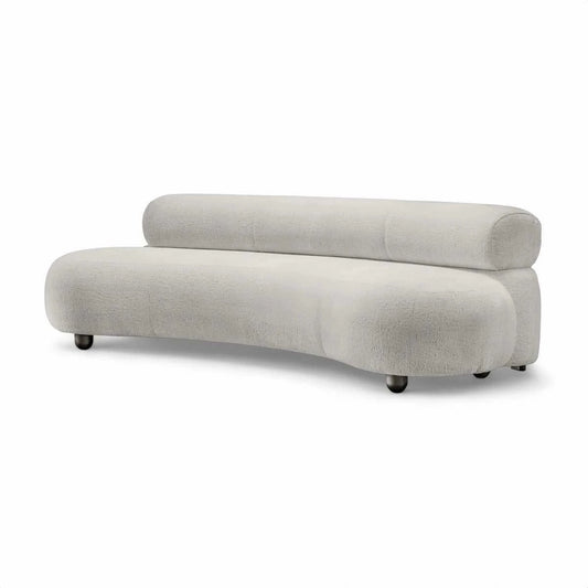 Eclipse sofa with curved silhouette and textured boucle upholstery in a modern living room