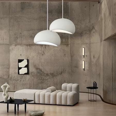 Modern Wabi Sabi Pendant Light with white stone-inspired shades in minimalist living room