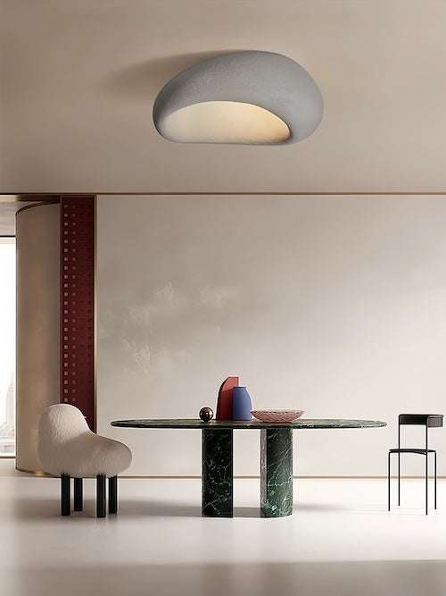 Minimalist Japanese Wabi Sabi LED ceiling light with frosted resin finish in modern dining room.