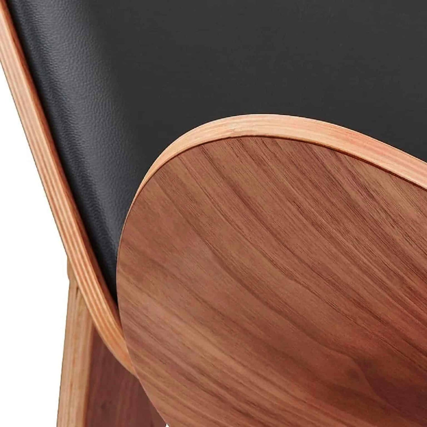 Shell Chair with black leather upholstery and walnut finish detail.