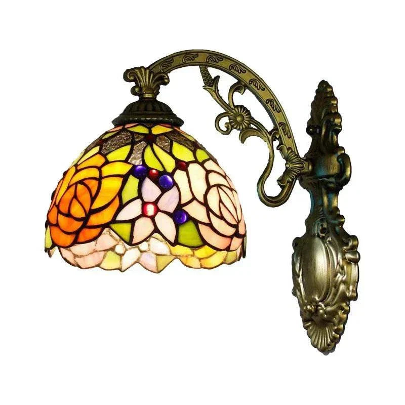 European style stained glass wall sconce with colorful floral design and vintage bronze finish