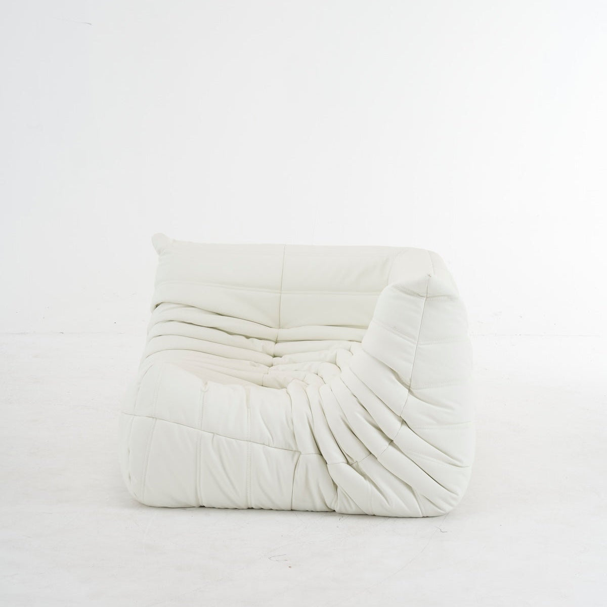 Luxurious customizable leather corner sofa in white, ergonomic and space-saving design.