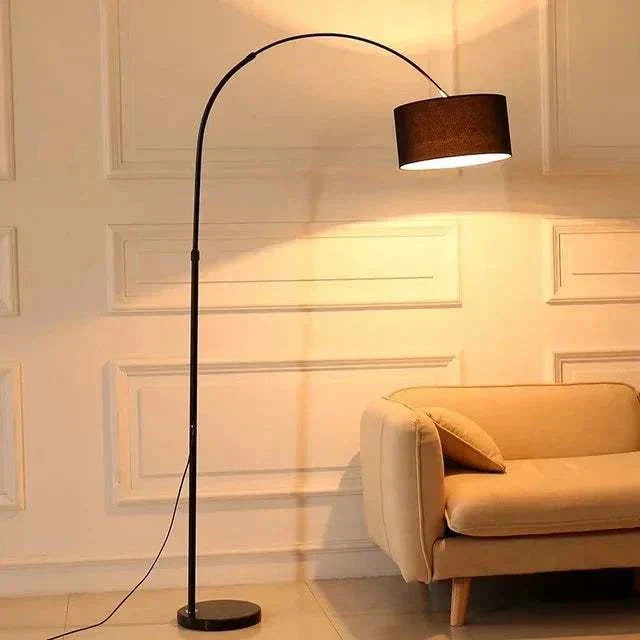 Modern black LED floor lamp with adjustable fabric shade near beige sofa in living room