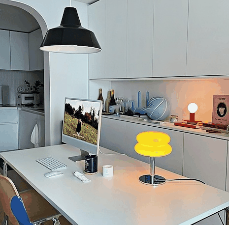 Modern Macaron LED Table Lamp with yellow stained glass shade on office desk