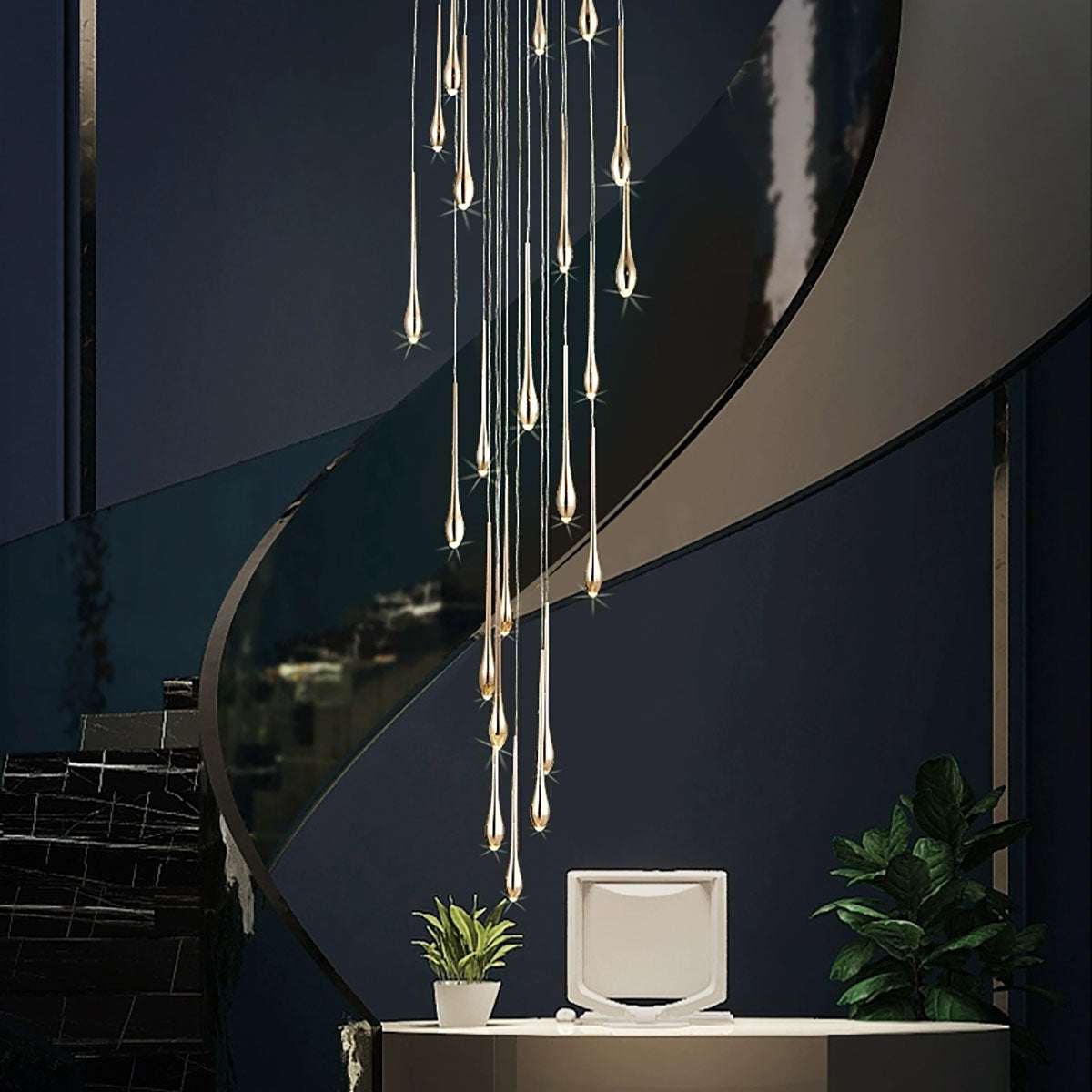 Minimalist LED chandelier with teardrop-shaped lights hanging over modern staircase in dark interior