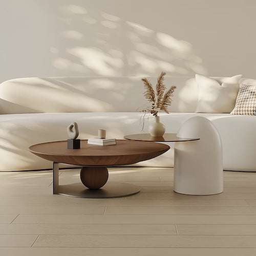 Modern walnut wood coffee table set with round tabletops and mixed height design in a minimalist living room