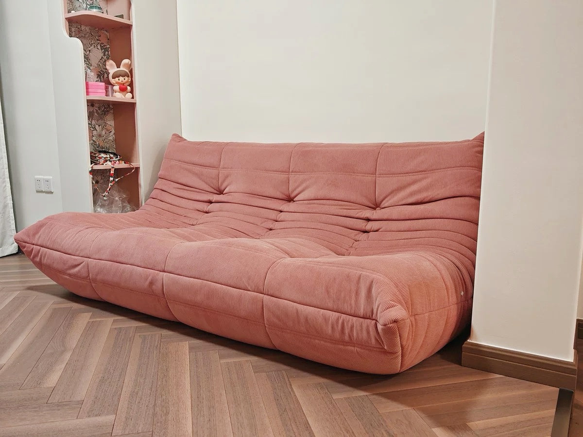 Togo Couch in orange corduroy, 3 seater sofa, vibrant and stylish design - sparkledecor.com