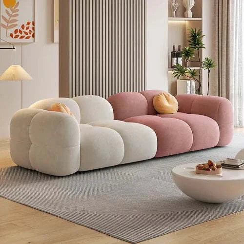 Modern Cloud sofa with plush oversized cushions in beige and coral pink for stylish living room comfort