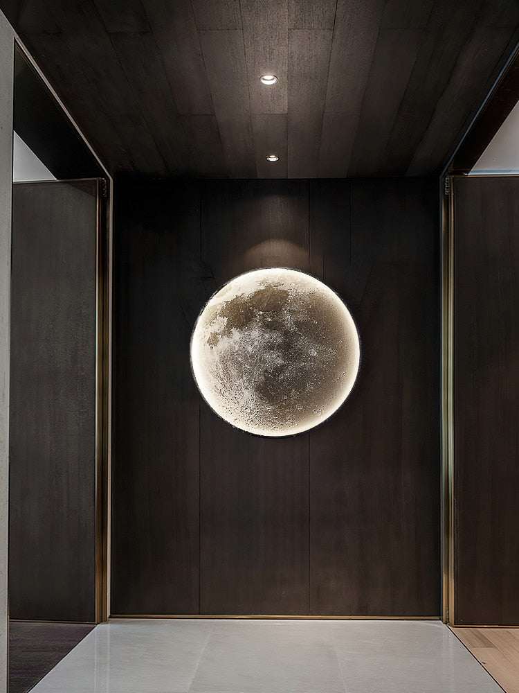 Modern Moon Wall Light illuminated on dark wall creating warm ambient lighting