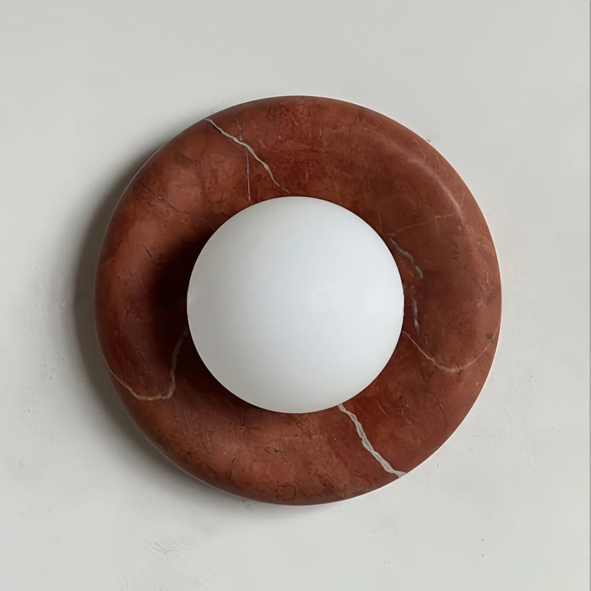 Natural travertine marble wall sconce with textured yellow marble and warm LED light for hotel and bedroom ambiance