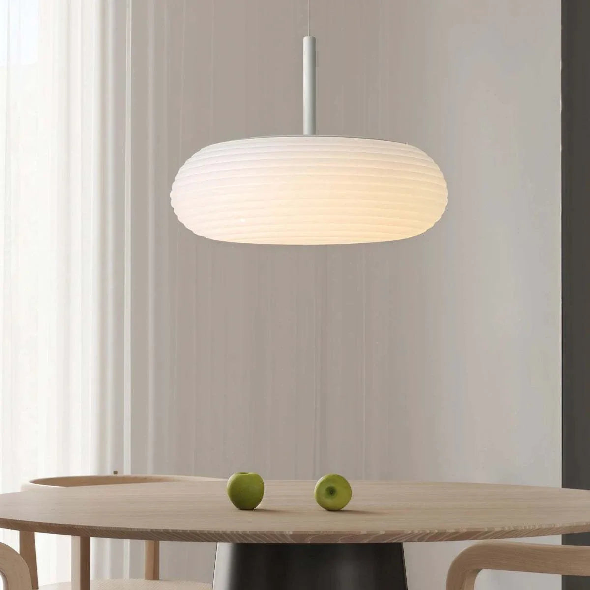 Minimalist Nordic pendant light with oval ribbed shade and adjustable cord for dining room and bedroom lighting