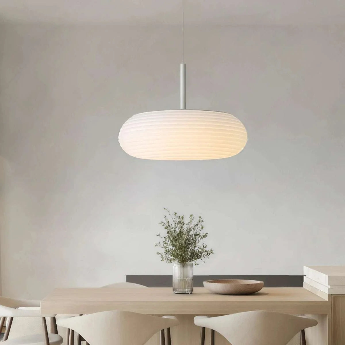 Minimalist Nordic pendant light with oval ribbed PE shade and adjustable iron suspension for dining room and bedroom ambient lighting