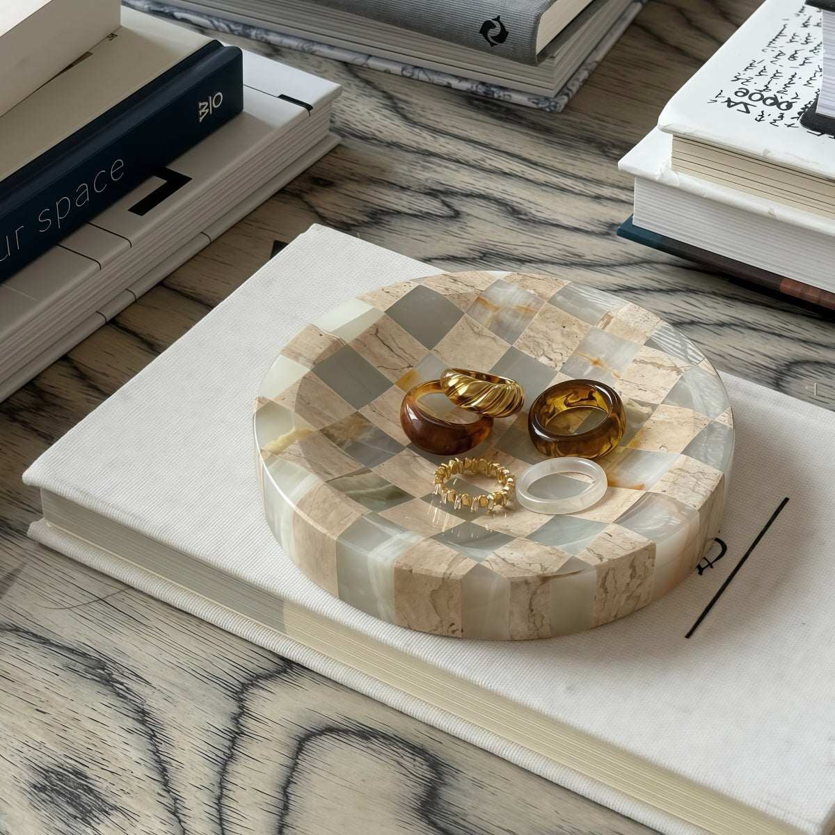Jewelry organizer tray in neutral stone mosaic with rounded edges, featuring compartments and Affordable Luxury design