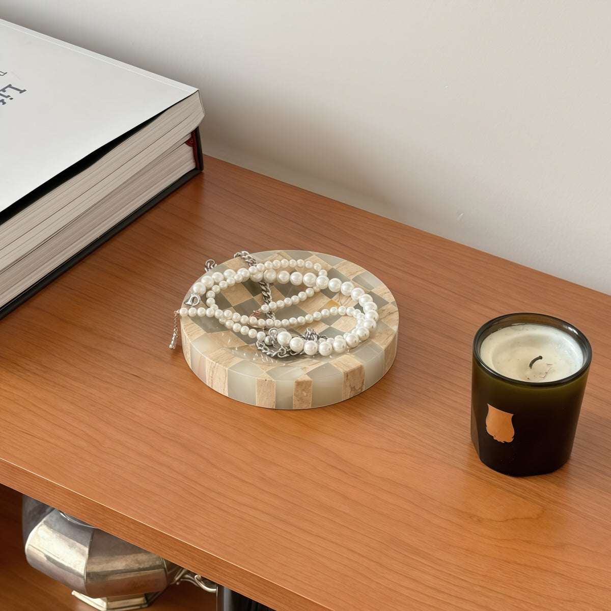 Jewelry organizer tray in cream and natural stone mosaic with a round shape, Affordable Luxury design and raised rim