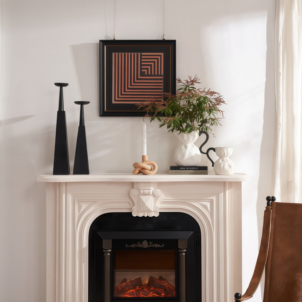 Irregular Ceramic Vase, white ceramic with a sculptural organic shape, holding leafy branches on a mantelpiece
