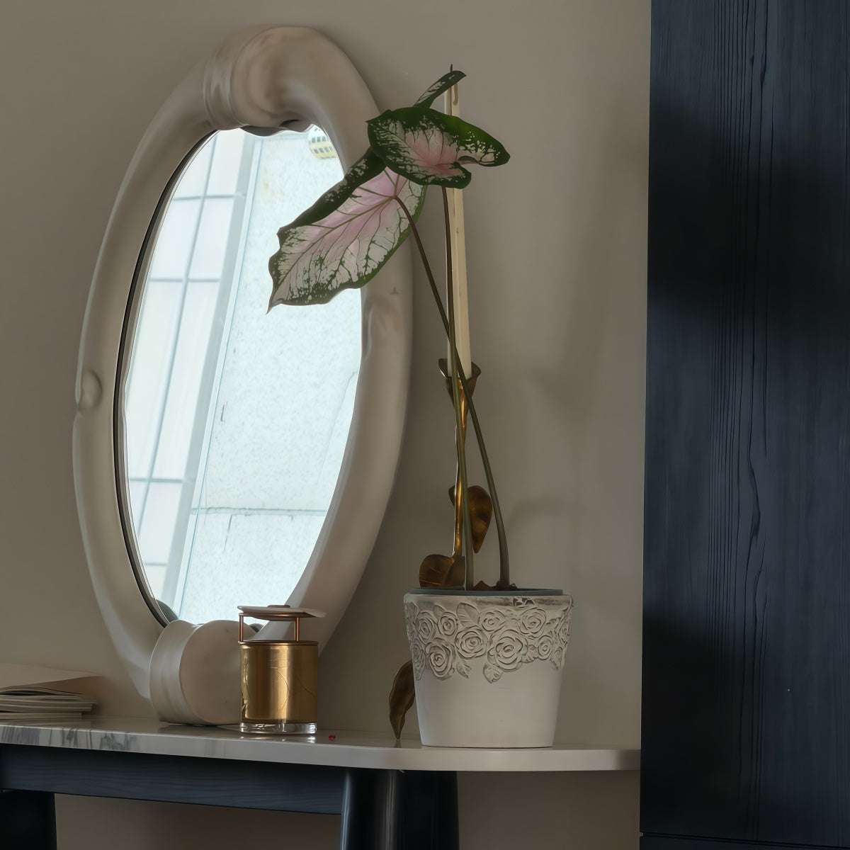 Cast Bronze Calla Lily candle holder in metallic bronze, featuring a slender stem and lily-shaped cup for candles