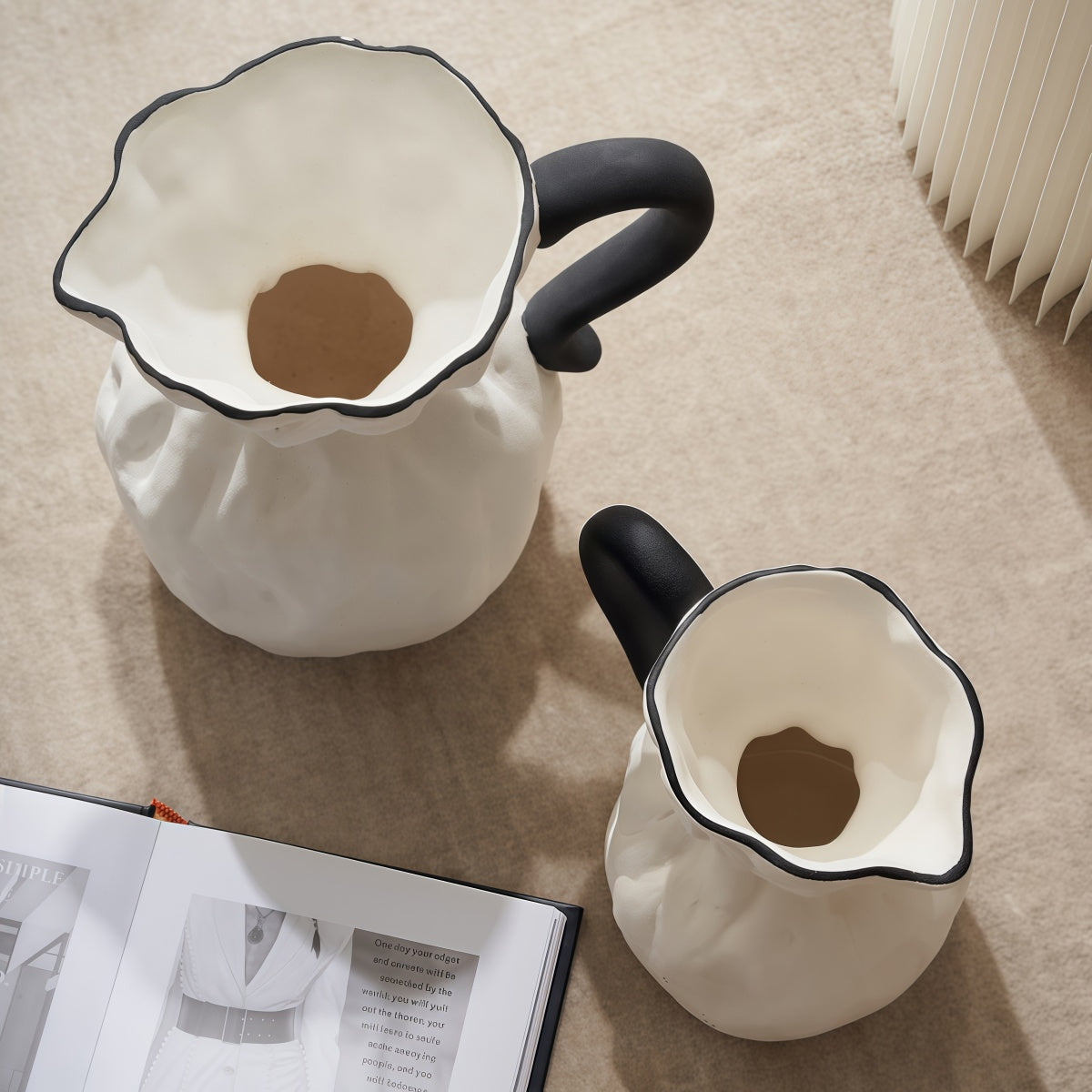 Irregular Ceramic Vase set in matte white ceramic with irregular fluted rims and black handles, two sizes