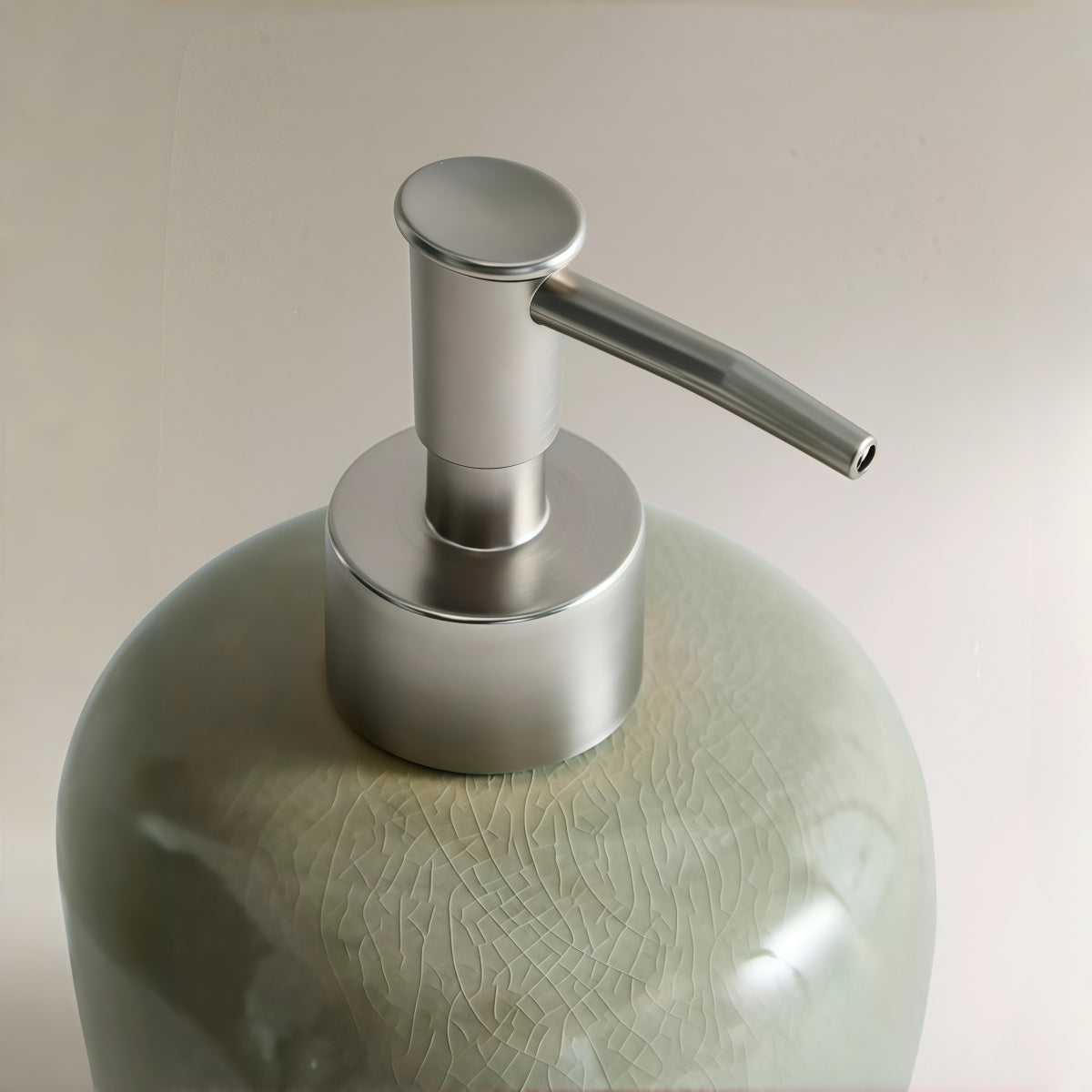 Lotion dispenser from the Vintage Green Crackle-Glaze Ceramic Set, pale green ceramic with a crackled finish and metal pump