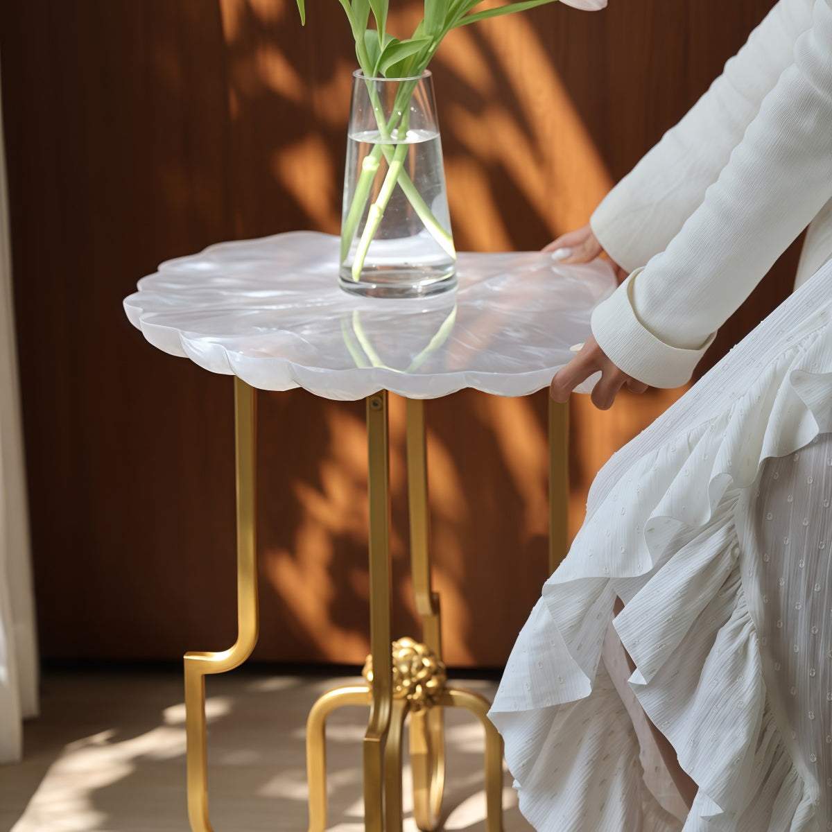 French Vintage-Style side table with translucent white shell-shaped resin top and glossy gold metal legs
