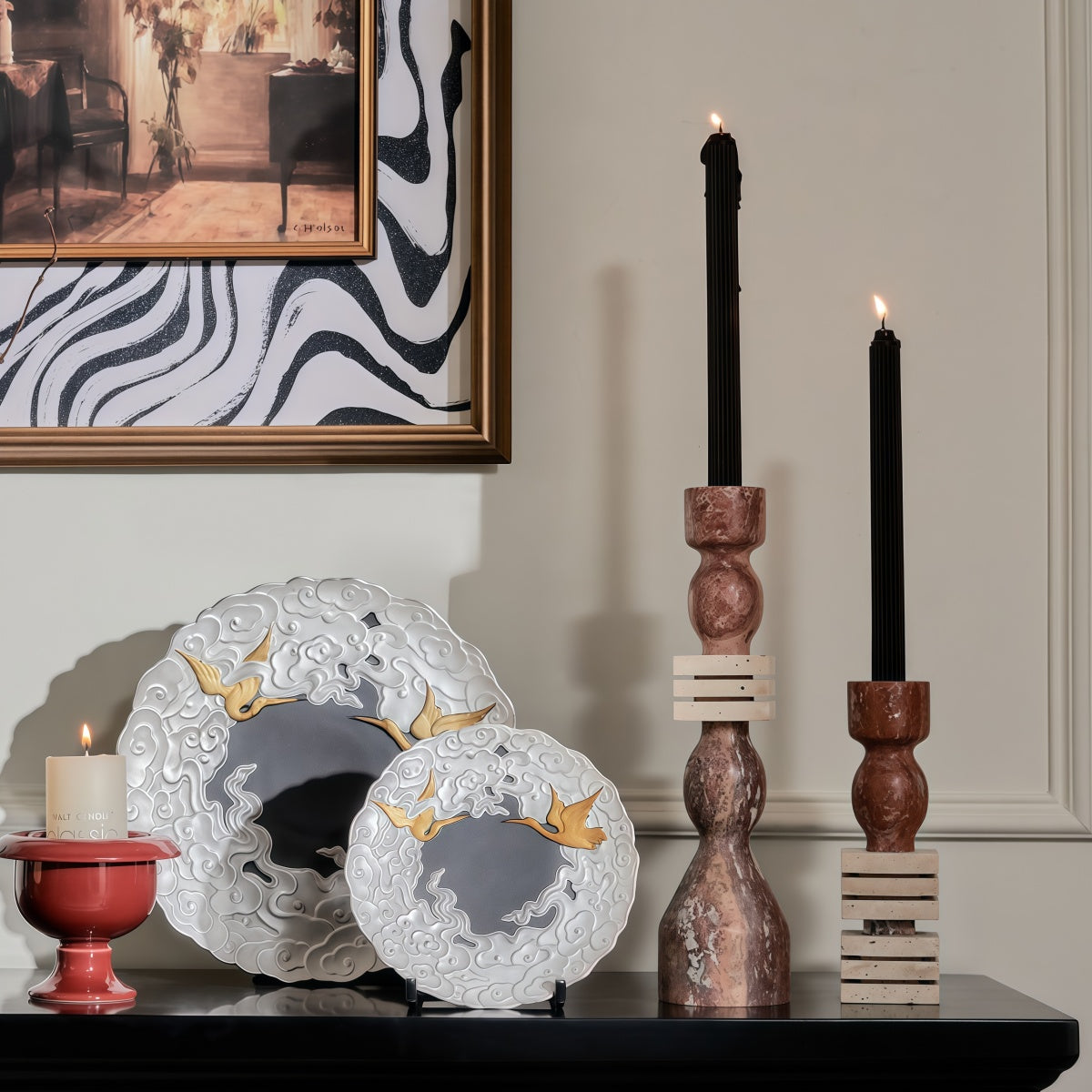 Marble candle holder in red-brown stone with rounded vintage forms, shown holding a black taper; French-Style Vintage-Inspired Fireplace decor.