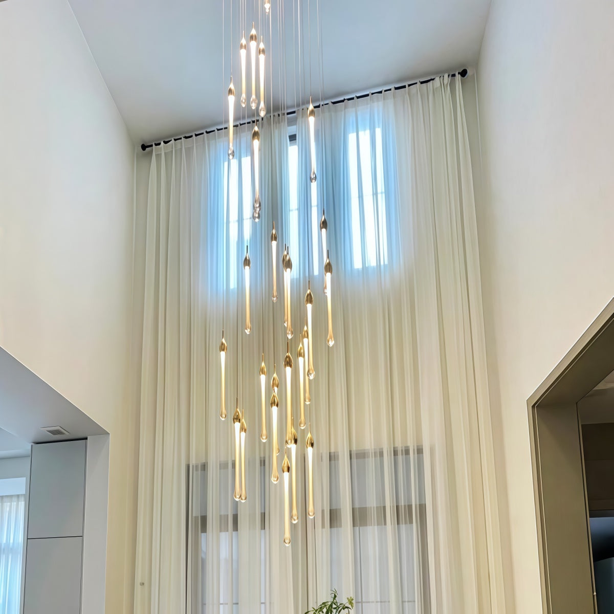 Minimalist Crystal Chandelier for Duplexes Teardrop-Style Staircase Pendant Light