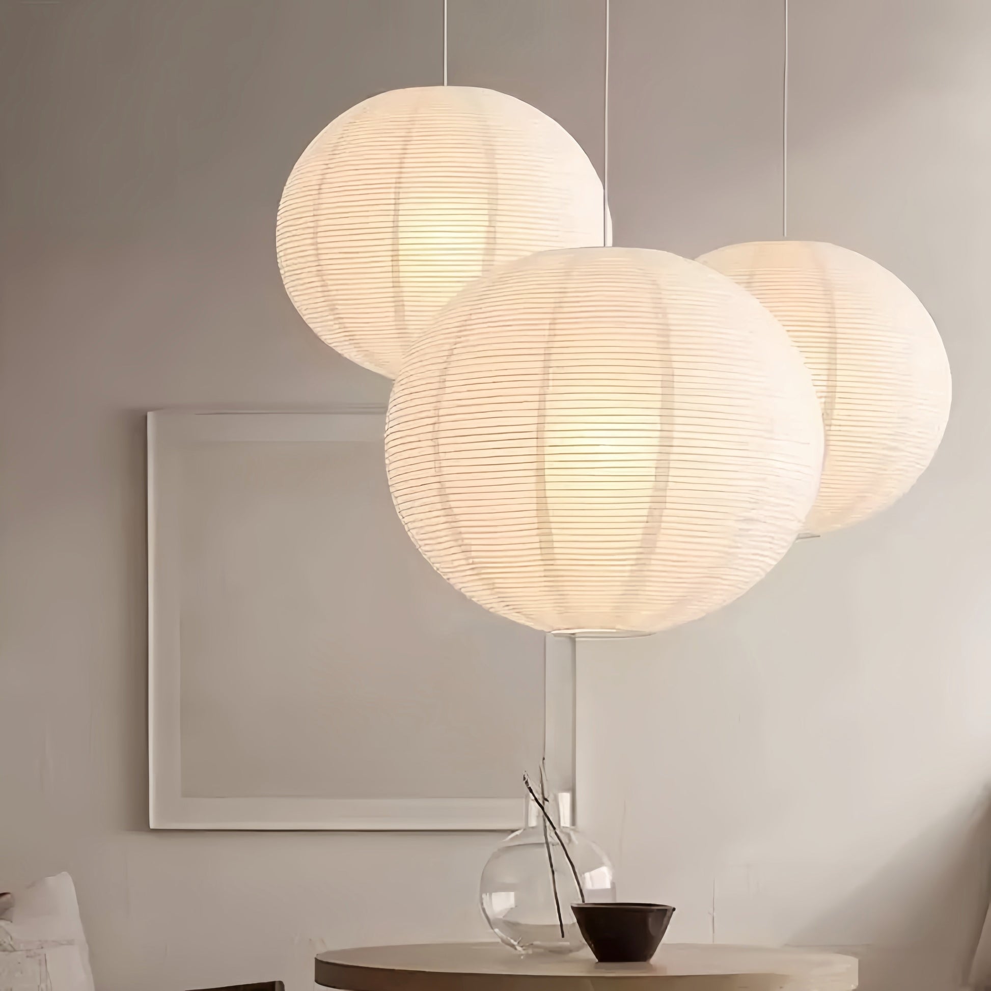 Noguchi Isamu rice paper pendant light fixture hanging from ceiling
