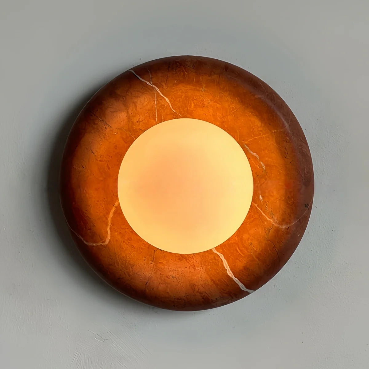 Natural travertine marble wall sconce with textured yellow marble and warm LED light for hotel, bedroom, and hallway ambiance