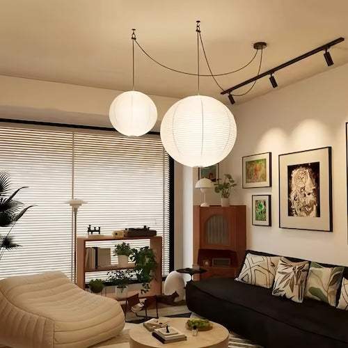 Noguchi Isamu rice paper pendant lighting fixture hanging from ceiling