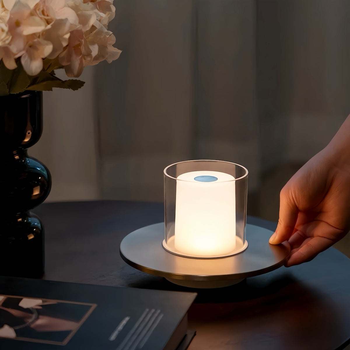 Rechargeable ambience night lamp with warm LED glow on table, perfect for dining and outdoor settings