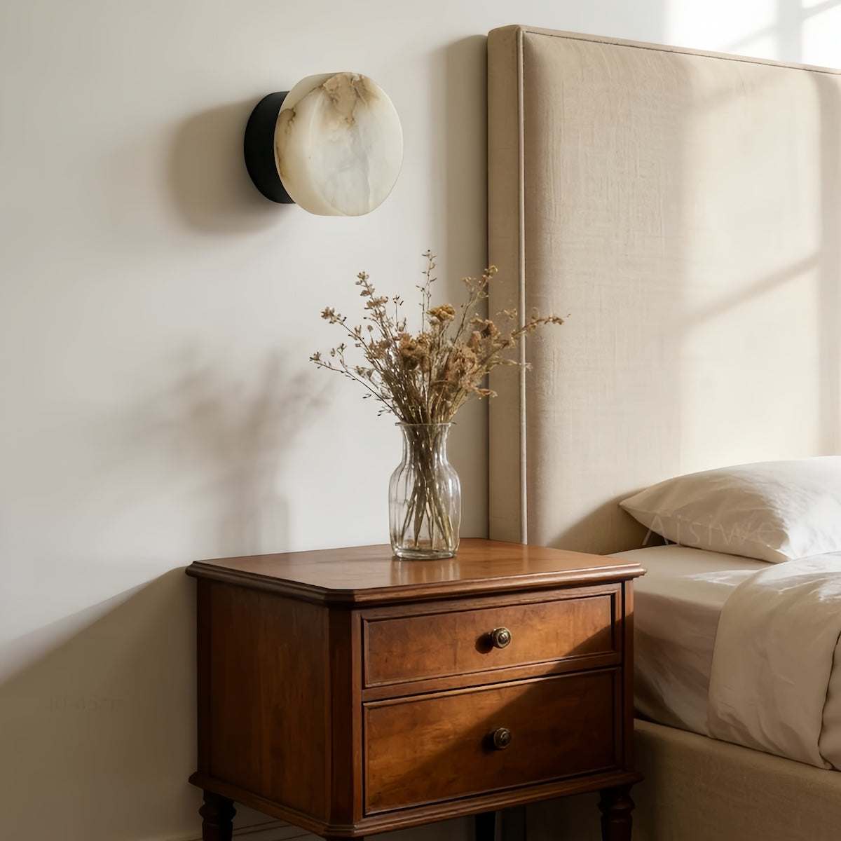 Natural onyx wall lamp with vintage minimalist round design and warm cream glow
