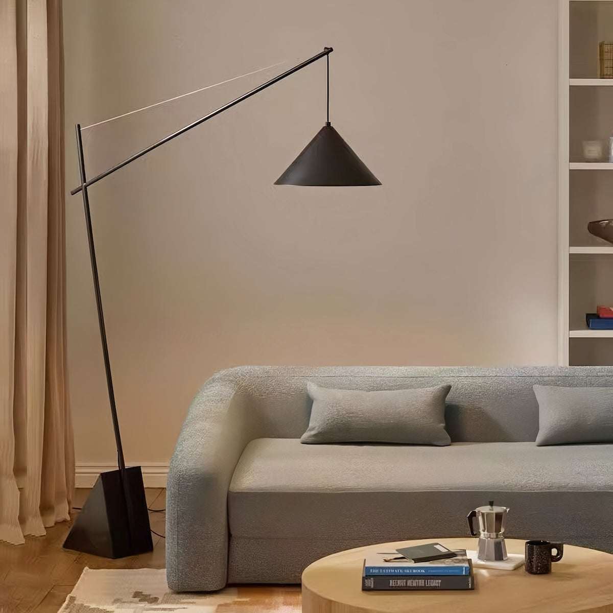 Minimalist Italian floor standing lamp with warm ambient LED light and sculptural iron and marble design for modern living rooms and bedrooms