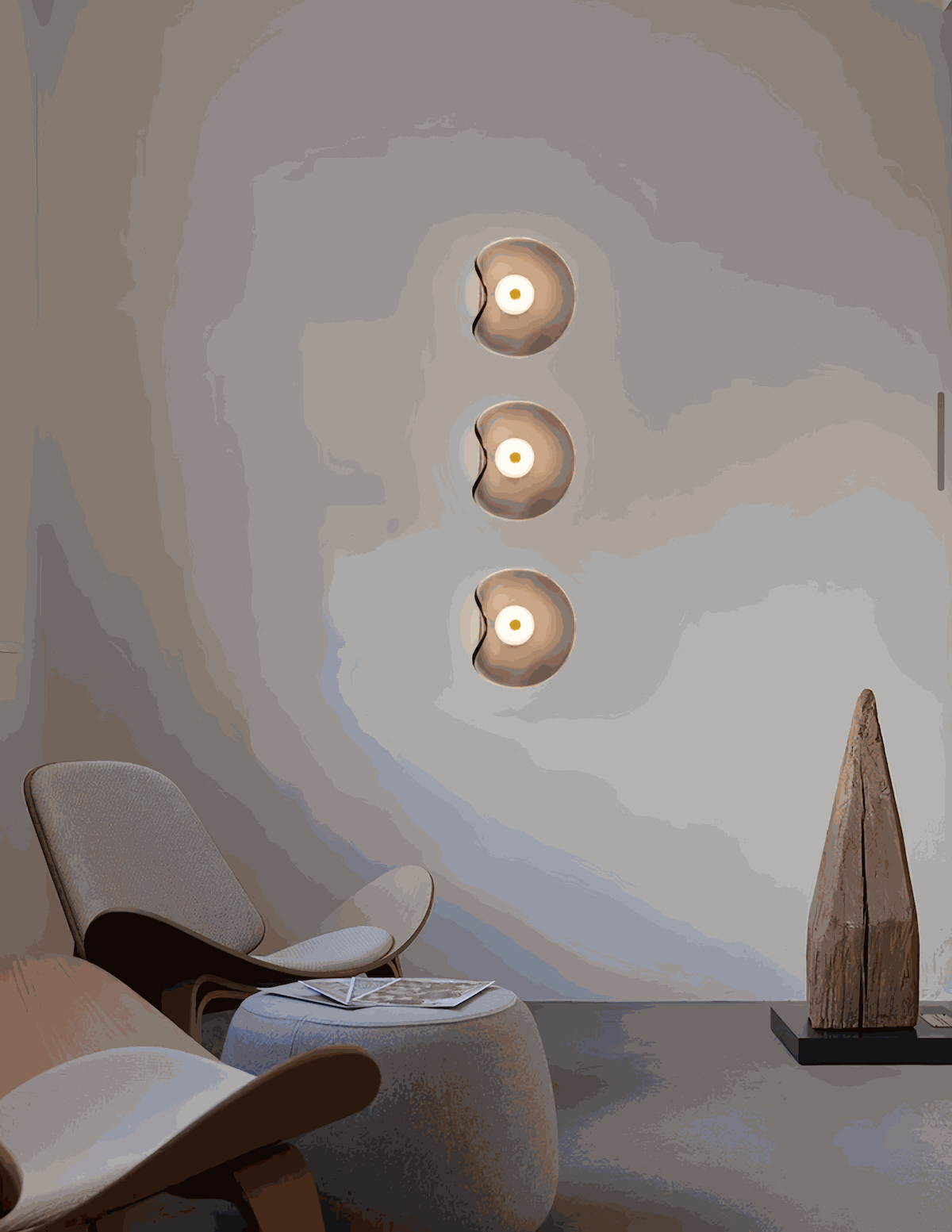 Round minimalist wall sconce with wrought iron frame and translucent amber glass shade emitting warm 5W LED light.