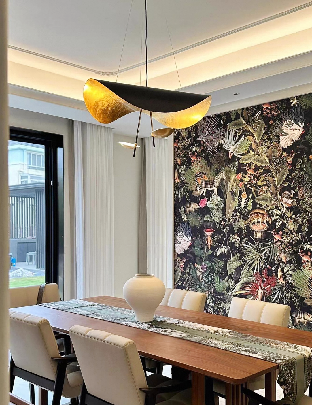 Black and gold foil modern chandelier with ultra-flat LED, adjustable suspension, and warm white light for luxury living and dining rooms