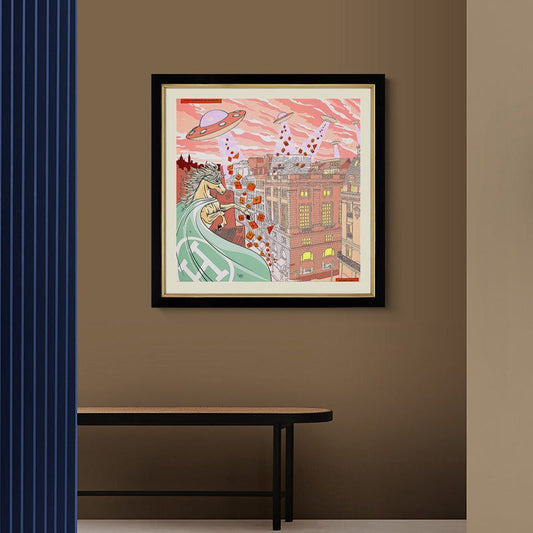 Large abstract wall art with colorful and expressive spray painting in a square canvas framed in black, displayed on a brown wall.