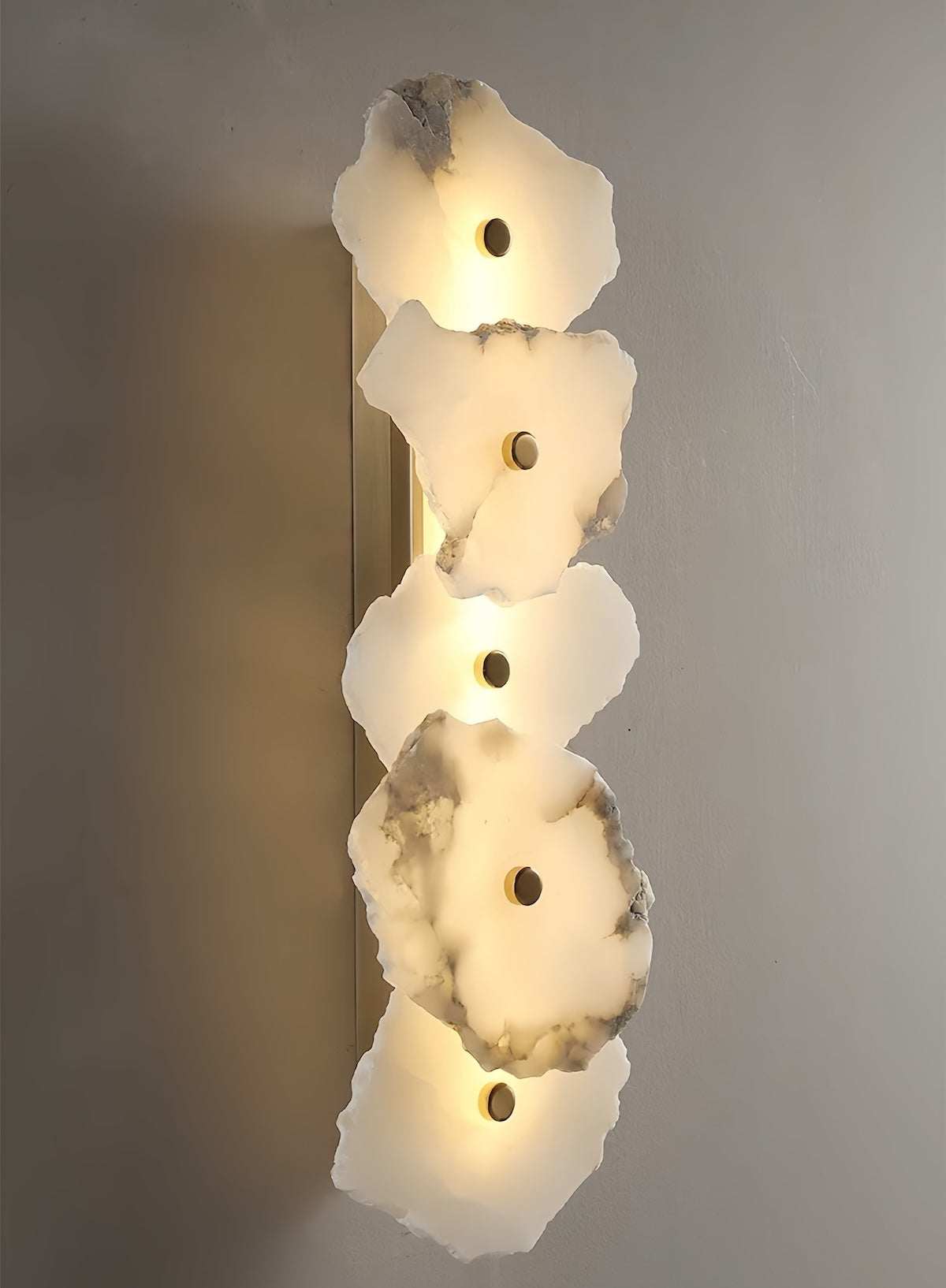 modern marble wall light with solid brass, energy-efficient LED, multiple disc design illuminating warm white light
