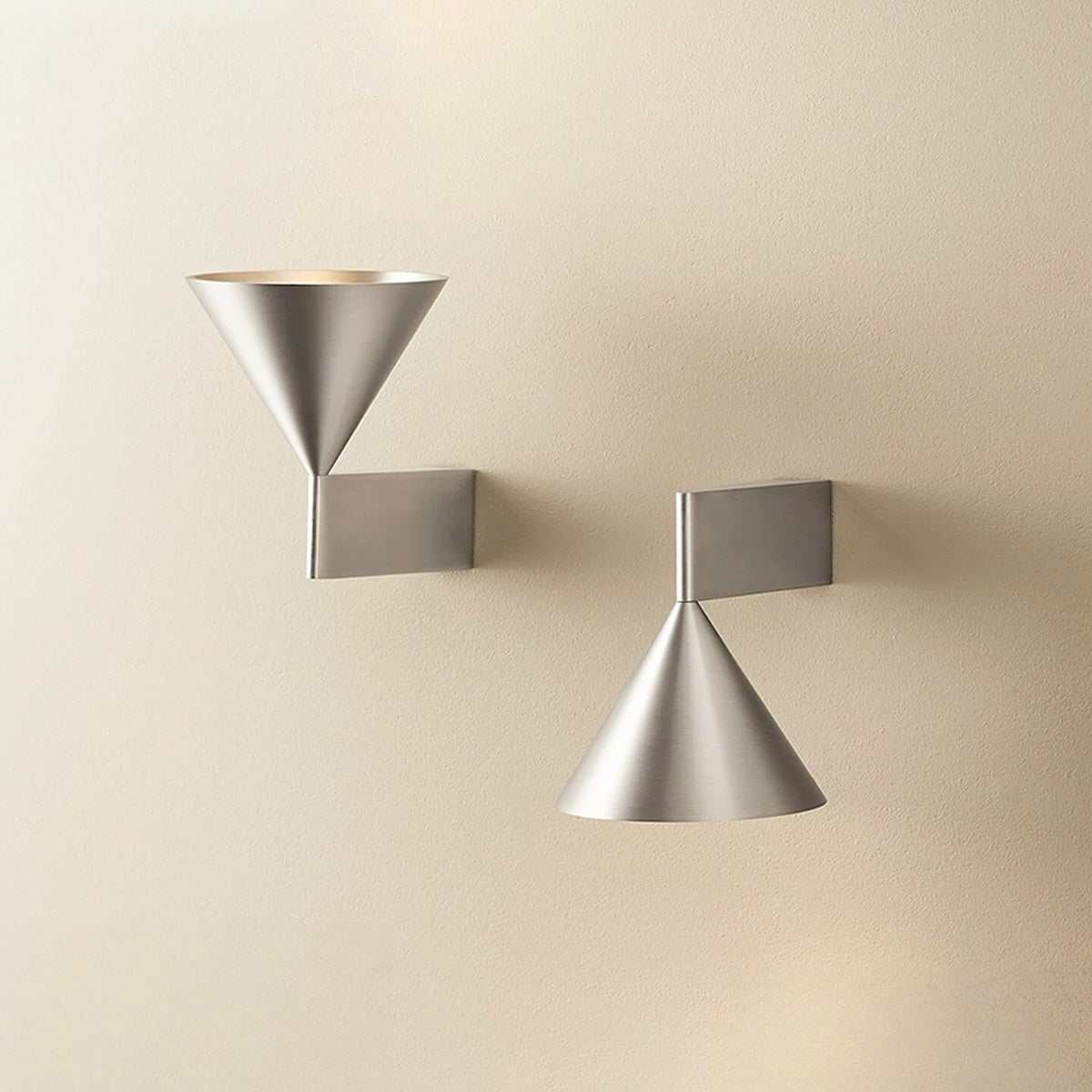 Italian minimalist modern wall sconce with conical shade and brushed anodized aluminum finish, warm 3000K LED light