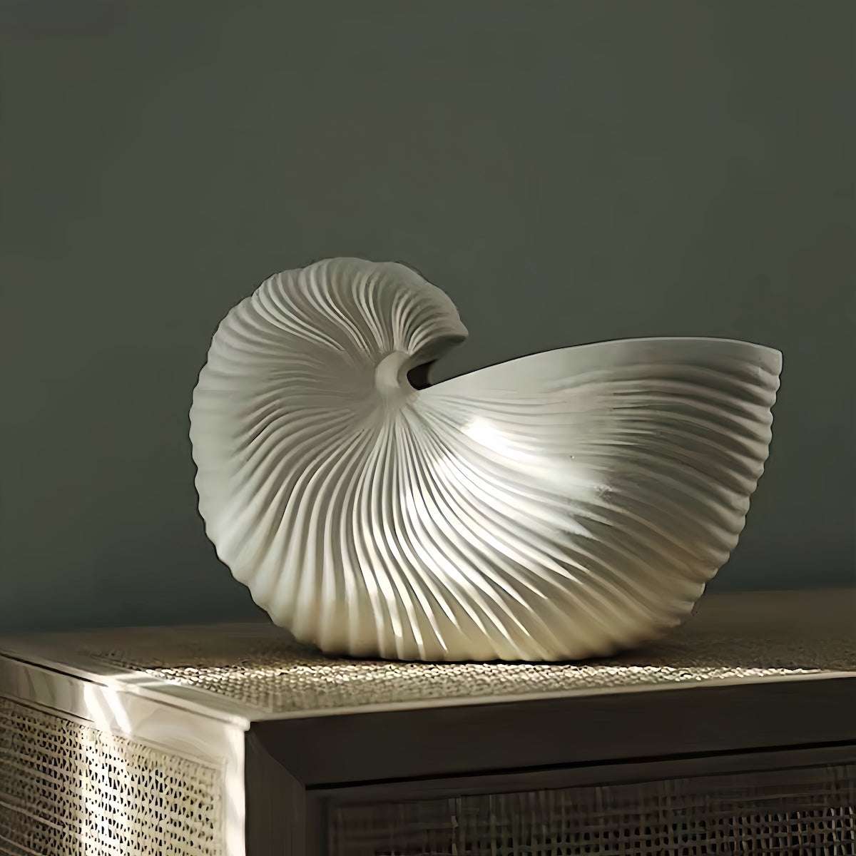Nordic style ceramic seashell vase with matte finish and elegant nautilus shell design for modern home decor