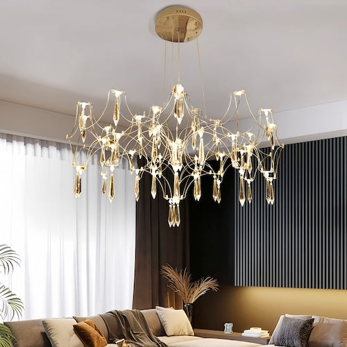 Stylish LED crystal chandelier illuminating a dining area with modern elegance - sparkledecor.com