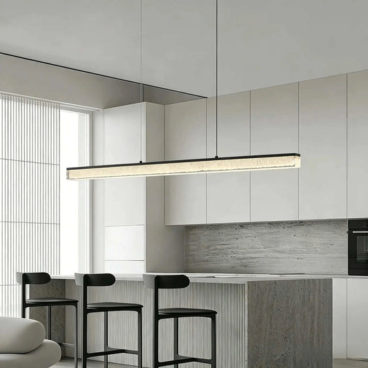 Italian minimal adjustable linear pendant lamp with black iron frame and acrylic shade over dining bar