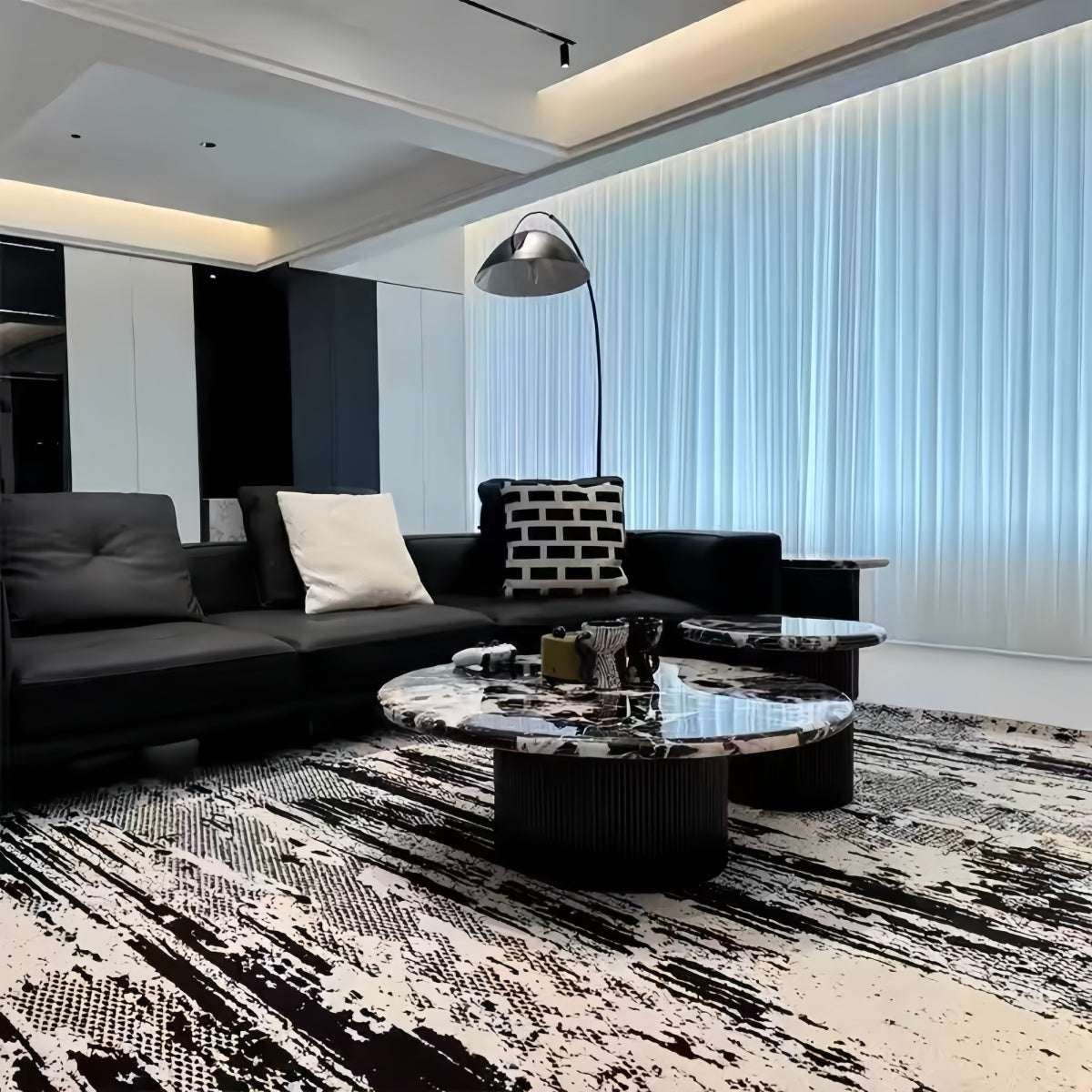 Marble coffee table with round marble-textured top and grooved cylindrical base in Italian light luxury style