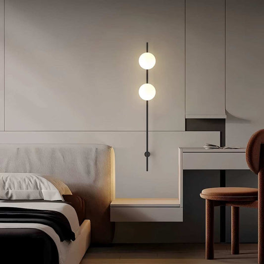 Minimalist brass wall sconce with cream-style glass shade and reinforced brass ceiling plate for warm bedroom and living room lighting