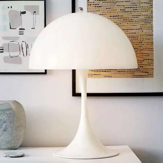 White mushroom small table lamp with LED bulb and modern design on white surface