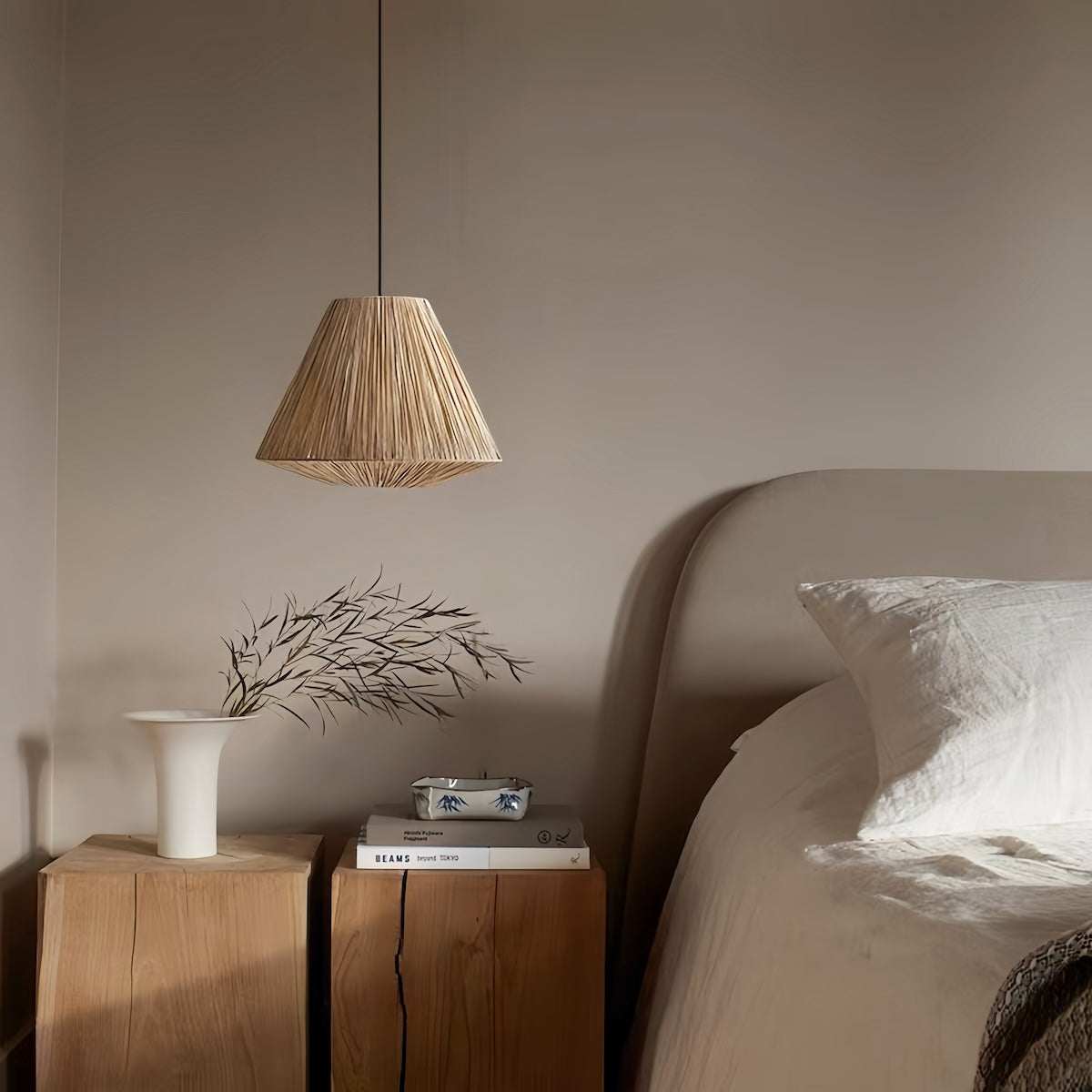 Handwoven rattan pendant light with warm ambient lighting for bedroom and dining areas